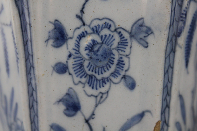 A pair of Dutch Delft blue and white flower holders, 18th C.