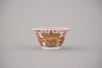 A Chinese porcelain famille rose armorial cup and saucer with VOC coat of arms, dated 1728, Yongzheng