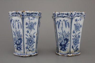 A pair of Dutch Delft blue and white flower holders, 18th C.