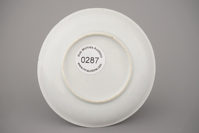 A Chinese porcelain famille rose armorial cup and saucer with VOC coat of arms, dated 1728, Yongzheng