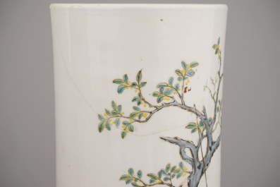 A pair of Chinese porcelain hat stands with playing boys, 19th C.