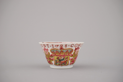 A Chinese porcelain famille rose armorial cup and saucer with VOC coat of arms, dated 1728, Yongzheng