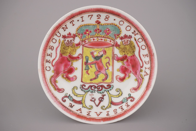 A Chinese porcelain famille rose armorial cup and saucer with VOC coat of arms, dated 1728, Yongzheng