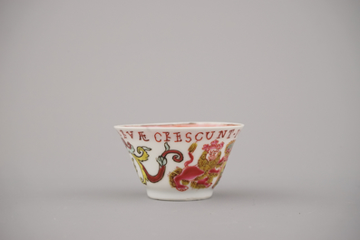 A Chinese porcelain famille rose armorial cup and saucer with VOC coat of arms, dated 1728, Yongzheng