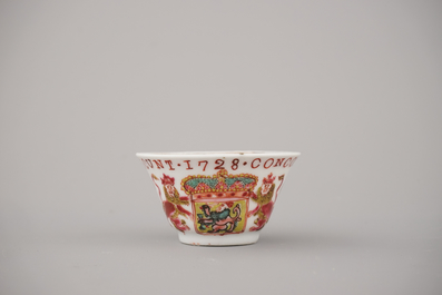 A Chinese porcelain famille rose armorial cup and saucer with VOC coat of arms, dated 1728, Yongzheng