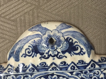 A rare Dutch Delft blue and white plaque of a wine tasting, 18th C.