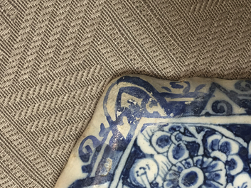 A rare Dutch Delft blue and white plaque of a wine tasting, 18th C.