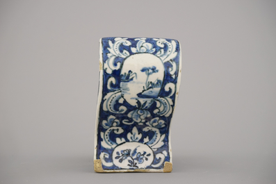 A rare Dutch Delft blue and white pipe holder, modelled as a sleigh, 18th C.
