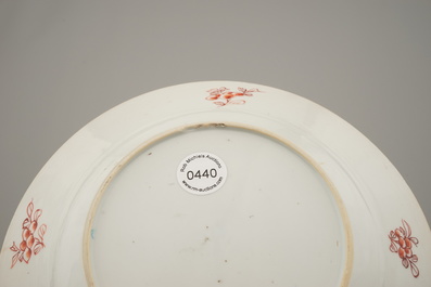 A Chinese porcelain Kakiemon style plate, Qianlong, 18th C.