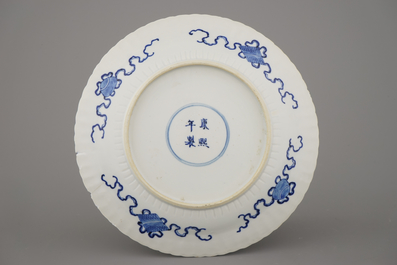 Two Chinese porcelain blue and white plates and three bowls, Kangxi and late Qing dynasty