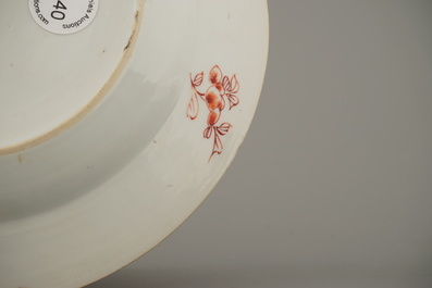 A Chinese porcelain Kakiemon style plate, Qianlong, 18th C.