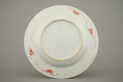 A Chinese porcelain Kakiemon style plate, Qianlong, 18th C.