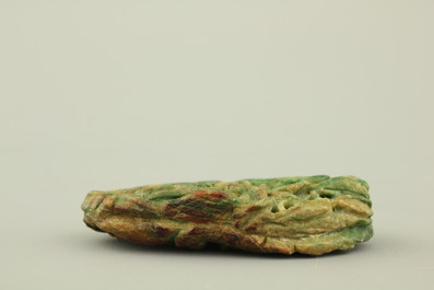 A green mottled jade carving of fruits, 20th C.