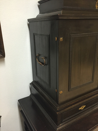 A South-German ebony veneer and gilded copper cabinet, 17th C.