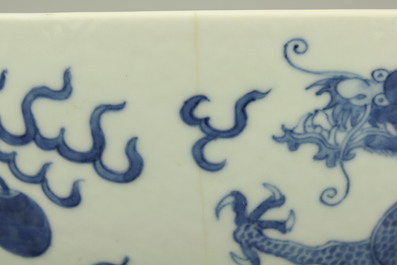 A pair of Chinese porcelain blue and white dragon bowls, 19th C.