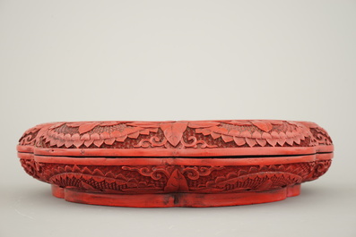 A Chinese carved cinnabar lacquer box and cover, 19th C.