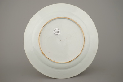 A Chinese porcelain famille rose plate, 18th C.