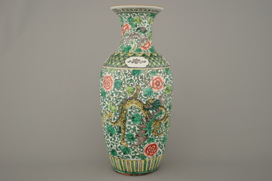 A Chinese famille verte vase with a dragon, 19th C.