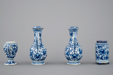 An exceptionally extensive Dutch Delft blue and white cruet set, 18th C.