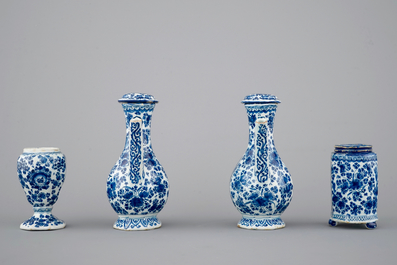 An exceptionally extensive Dutch Delft blue and white cruet set, 18th C.