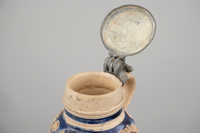 A manganese and blue Westerwald pewter-mounted globular jug, 17th C.