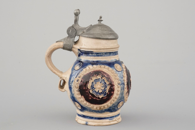 A manganese and blue Westerwald pewter-mounted globular jug, 17th C.