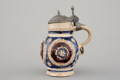 A manganese and blue Westerwald pewter-mounted globular jug, 17th C.