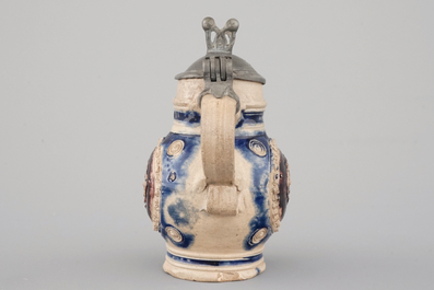 A manganese and blue Westerwald pewter-mounted globular jug, 17th C.