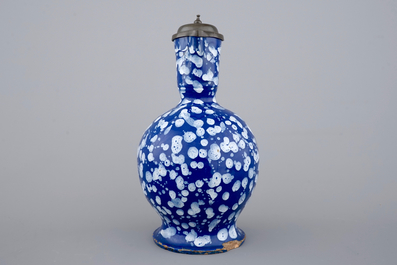 A rare Nevers pewter-mounted jug in "Bleu Persan" style, 17th C.
