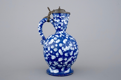 A rare Nevers pewter-mounted jug in "Bleu Persan" style, 17th C.