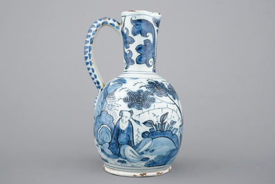 A Dutch Delft blue and white chinoiserie jug, 17th C.