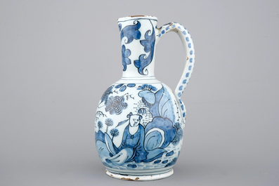 A Dutch Delft blue and white chinoiserie jug, 17th C.