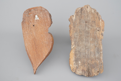 Two carved wood putto heads, 18th C.
