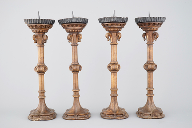 Un ensemble de 4 bougeoirs neo-gothiques, 19&egrave;me si&egrave;cle