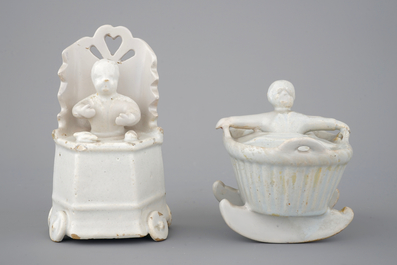Two monochrome white Dutch Delft figures of children, 18th C.
