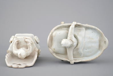 Two monochrome white Dutch Delft figures of children, 18th C.