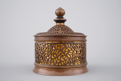 A cylindrical brass and bronze box and cover, 16/17th C., probably Venice