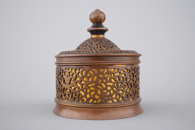 A cylindrical brass and bronze box and cover, 16/17th C., probably Venice