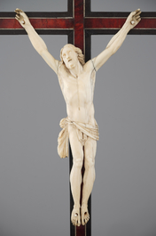 Two carved ivory corpus christi, mounted on ebony and tortoise shell crucifix, 18/19th C.