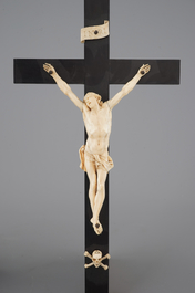 Two carved ivory corpus christi, mounted on ebony and tortoise shell crucifix, 18/19th C.