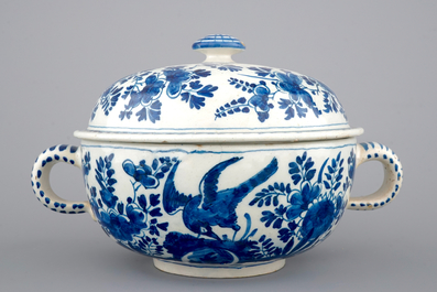 A dated Dutch Delft blue and white round bowl with cover for spiced wine, ca. 1709