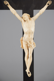 Two carved ivory corpus christi, mounted on ebony and tortoise shell crucifix, 18/19th C.