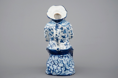 A blue and white Dutch Delft figural "Bobbejak" table fountain, 18th C.
