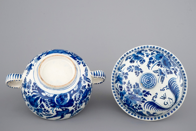 A dated Dutch Delft blue and white round bowl with cover for spiced wine, ca. 1709