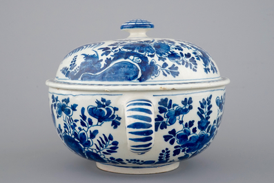 A dated Dutch Delft blue and white round bowl with cover for spiced wine, ca. 1709