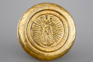 A good Nuremberg brass alms bowl showing Mary on the crescent moon, 16th C.