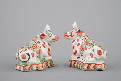 A pair of petit feu polychrome Dutch Delft cows, 18th C.
