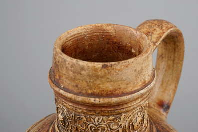 A Raeren armorial stoneware jug, ca.1600