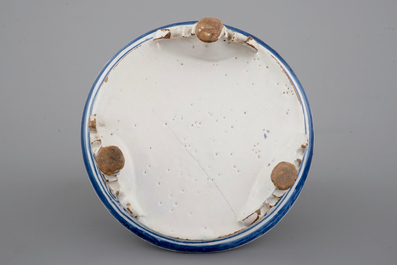 A Dutch Delft tripod saucer in cashemire palette, ca. 1700