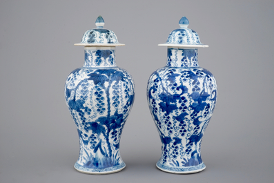 A pair of blue and white vases and covers, Kangxi, ca. 1700